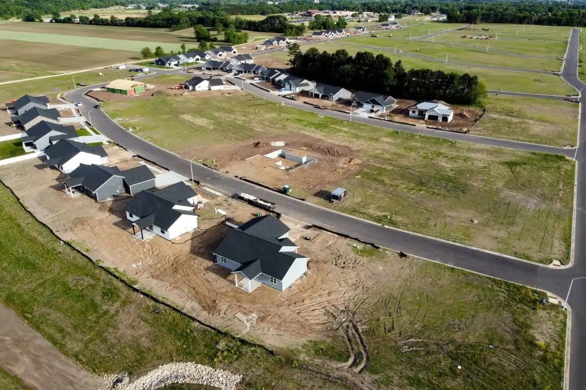 Aerial view of a new housing development with homes under construction